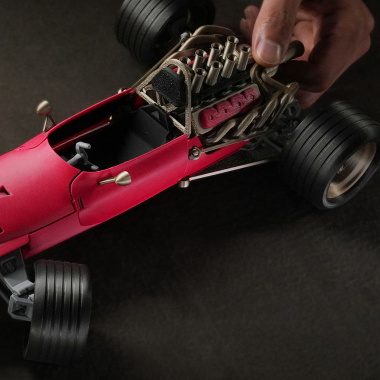 Bambu Lab P2S multi-material print sample of red race car